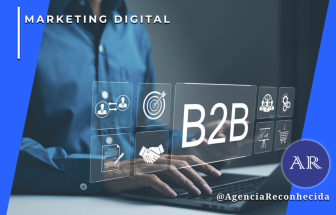 Homem em camisa azul utilizando um notebook, com ícones digitais flutuantes à frente representando networking, metas, contratos e parceria. No centro, a sigla 'B2B' em destaque. No canto superior esquerdo, o selo 'MARKETING DIGITAL' em fundo azul e, no inferior direito, o logotipo da Agência Reconhecida com o @AgenciaReconhecida.