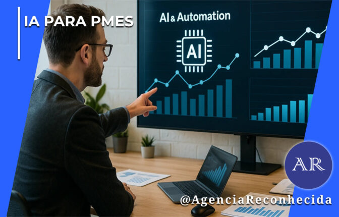 Um homem de terno e óculos aponta para um monitor grande fixado na parede que exibe gráficos de crescimento e o ícone de um chip de Inteligência Artificial com o texto "AI & Automation". Ele está sentado em uma mesa de escritório de madeira onde há um notebook aberto, documentos impressos e pequenos vasos de plantas. No topo esquerdo, o texto "IA para PMEs" e, no canto inferior direito, o logotipo azul redondo "AR" com a assinatura @AgenciaReconhecida.